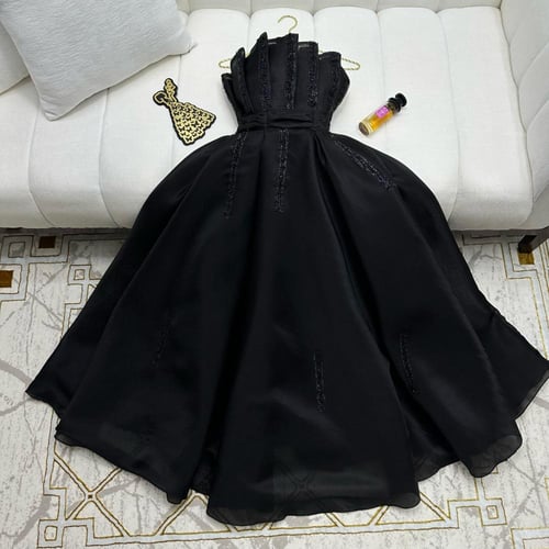 فستان سهرة الخامة اورجنزه بتصميم جميل