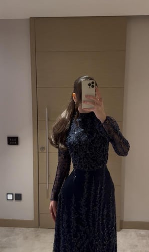 فستان سهرة كلفة مطرزه بشغل احترافي