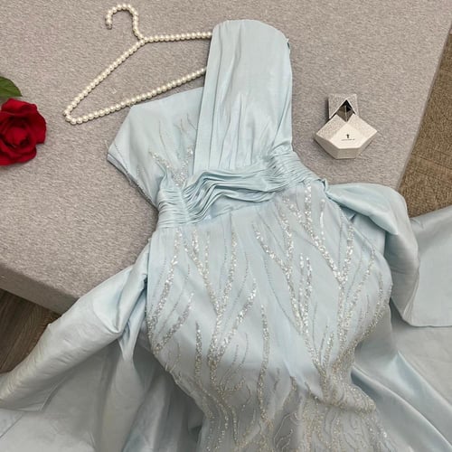 فستان باللون السماوي تطريز يدوي