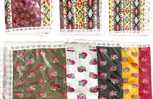 مفرش طاوله شالكي ملبس بلاستيك