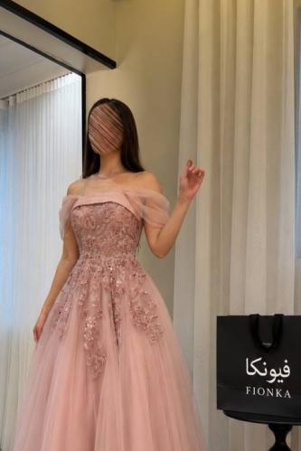 Soft pink dress with a flared design