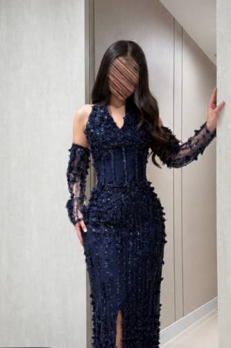 Luxurious navy blue dress with striking embroidery