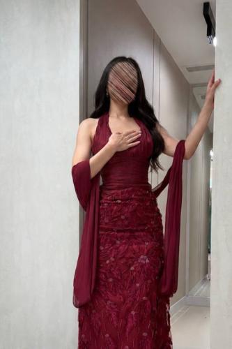 Luxurious maroon dress, soft, highlights the figure with flowiness