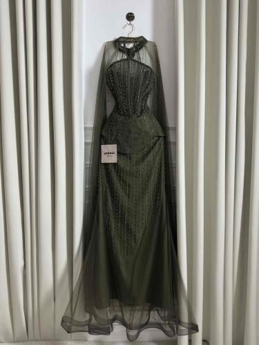 Luxurious olive evening dress with a corset design encrusted with pearls and a royal chiffon cape from Shamous store