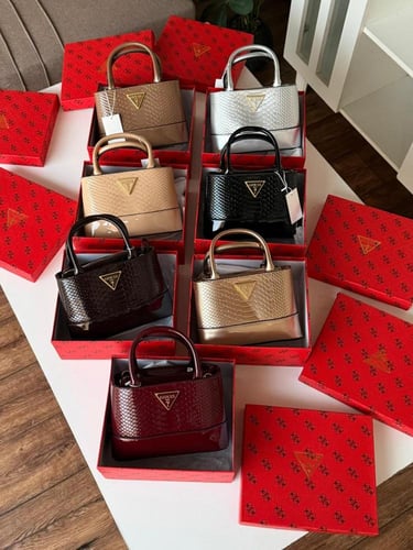 شنطة يد نسائية فاخرة بنقشة جلد الثعبان من جيس