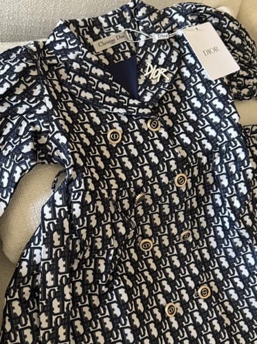 فستان ديور على شكل معطف جاكار مبطن