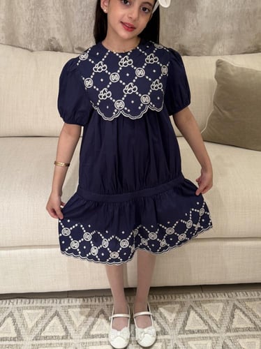 فستان قوتشي مطرز يدوي بابيض