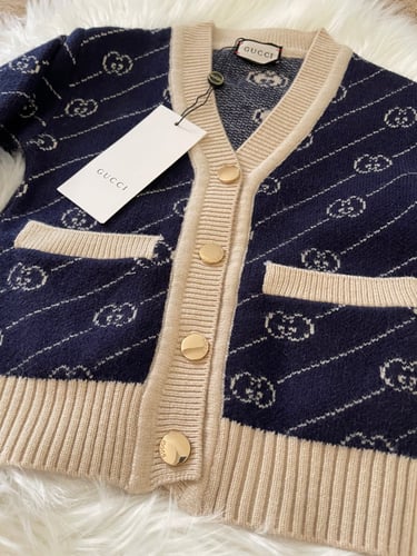 سويتر قوتشي صوف للجنسين