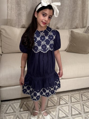 فستان قوتشي مطرز يدوي بابيض