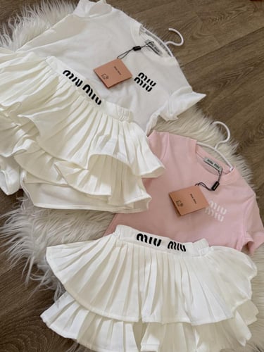 تيور ميوميو داخله شورت باللون الاوف وايت