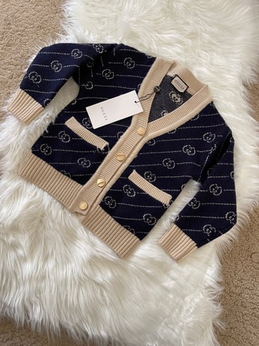 سويتر قوتشي صوف للجنسين