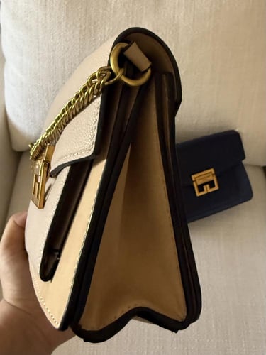 حقيبة جفنشي مخمل وجلد مع ذهبي مطفي