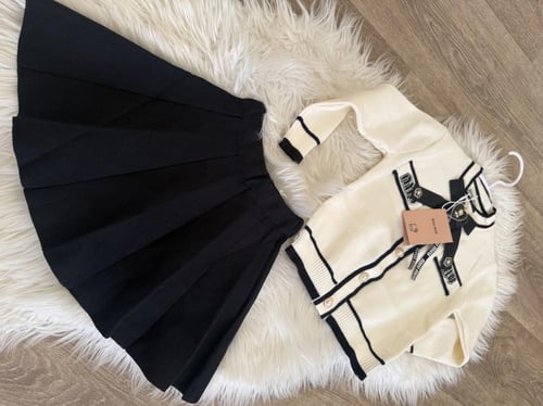 تيور دافئ من الصوف المحبوك ميوميو مزين بأزارير لؤل...