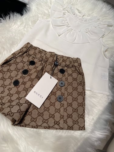 طقم بناتي قوتشي قطعتين شورت+بلوزة