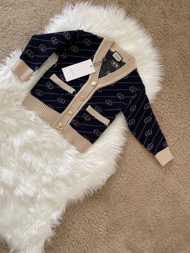 سويتر قوتشي صوف للجنسين