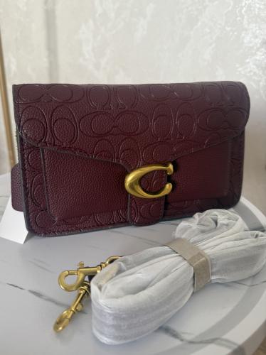 حقيبة كوتش باللون البرغندي المطفي الحجم الكبير