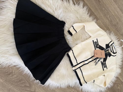 تيور دافئ من الصوف المحبوك ميوميو مزين بأزارير لؤل...