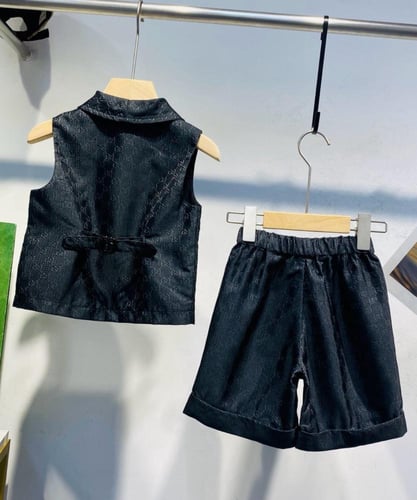 بدلة قوتشي ولادي كحلي ٤قطع جاكار