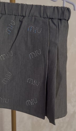 تيور ميوميو مزين بفيونكات من الخلف