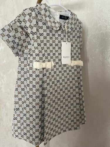 فستان قوتشي مزين بفيونكات