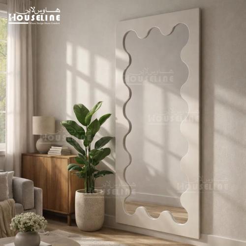 مرآة جدارية بإطار متموج – تصميم عصري بلمسة فنية أن...