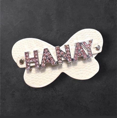 مشبك شعر بالاسم