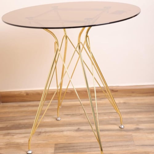 طقم طاولة طعام ستيل ذهبي بسطح قزاز دائري مع 2 كراس...