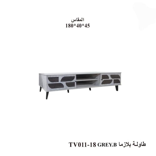 طاولة تلفزيون خشبية بتفاصيل هندسية أنيقة ألوان و ا...