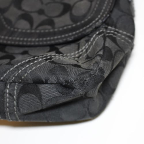 Coach Chelsea black signature jacquard turn-lock s...