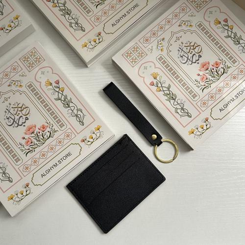 توزيعات العيد” محفظة و ميداليه جلد "