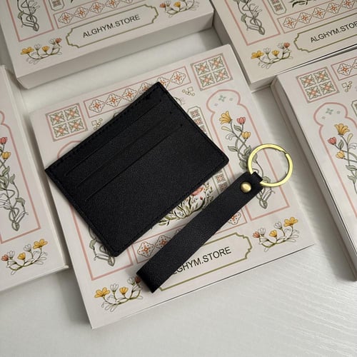 توزيعات العيد” محفظة و ميداليه جلد "