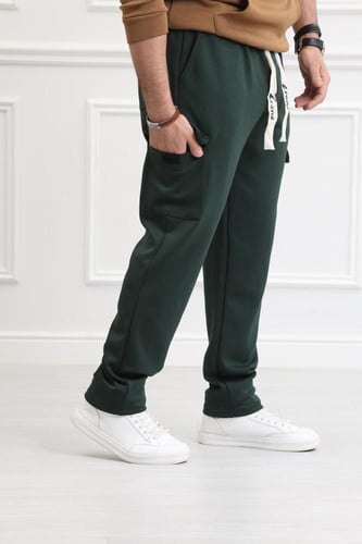 بنطلون رياضي كارجو بخصر مطاطي وقصة واسعة ومستقيمة...