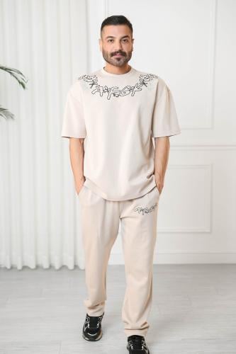 Men's oversized set, short sleeves, long pants, round collar decorated with patterns on the T-shirt and the pants