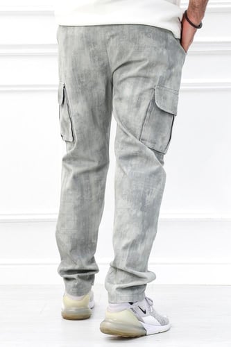 بنطال رجالي عصري بمظهر مغسول وقصة واسعة مزود بجيوب...