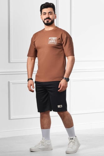 تيشرت رجالي اوفر سايز مزينة بطبعة بأحرف وزسومات عل...