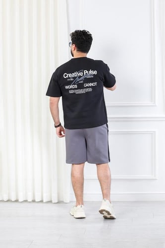 طقم رجالي كاجوال شورت بأكمام قصيرة وياقة دائرية مز...