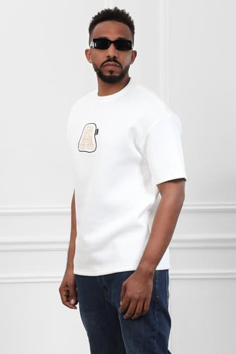 تيشرت رجالي اوفر سايز مزود بطبعة من الأمام وأكمام...