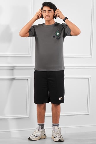 تيشرت رجالي اوفر سايز مزين بطبعة هندسية متماثلة عل...