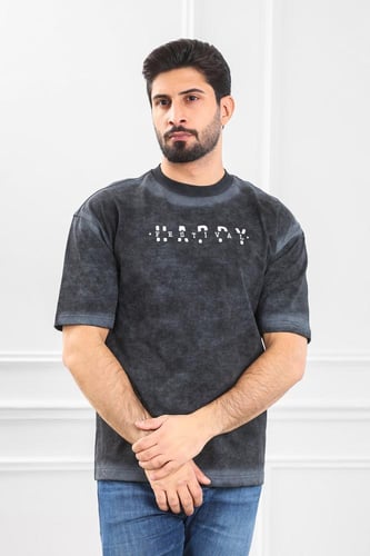 تيشرت رجالي أوفر سايز مغسول مزين بأحرف HAPPY Festi...