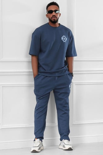 طقم رجالي صيفي كاجوال اوفر سايز مكون من تيشرت و بن...