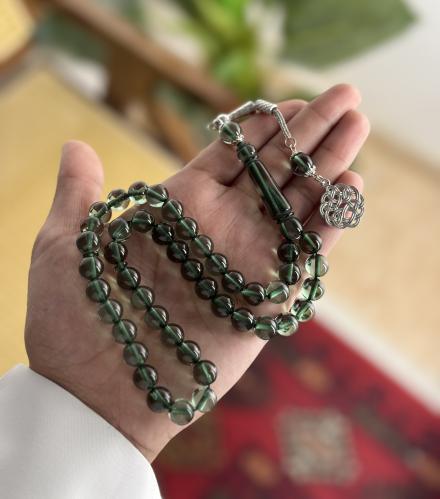 سبحة بكلايت زيتي شفاف