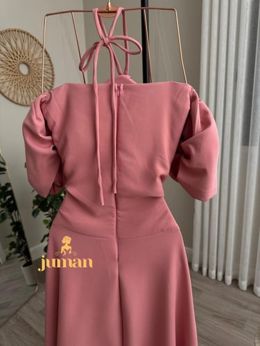 فستان زهري ناعم حركه بالصدر