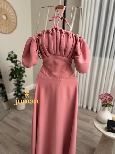 فستان زهري ناعم حركه بالصدر