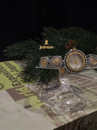 ساعة يد زراكون ذهبي وفضي بتصميم دائري بقطرات