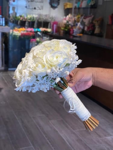 مسكة روبي (ورد صناعي)