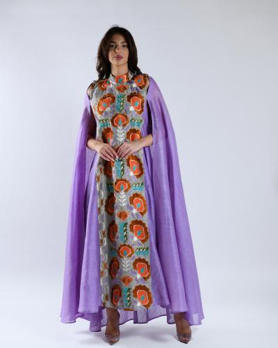 A purple Jalabiya with luxurious colorful embroidery