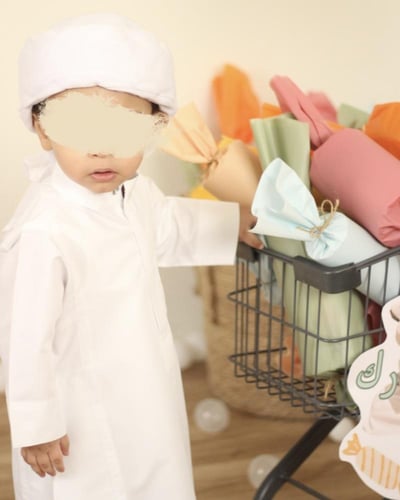 توزيعات حلويات العيد ٢٤ حبة مع عربة بتصميم خاص و ب...