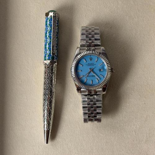 طقم ساعة وقلم