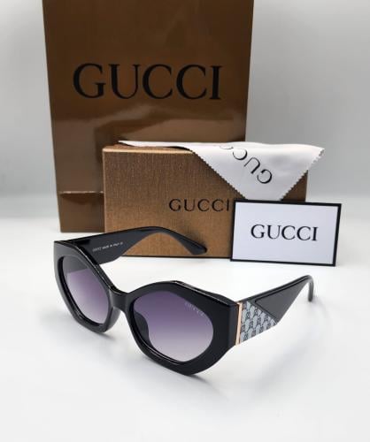 نظارة قوتشي - إطار دافئ، عدسات سوداء أنيقة