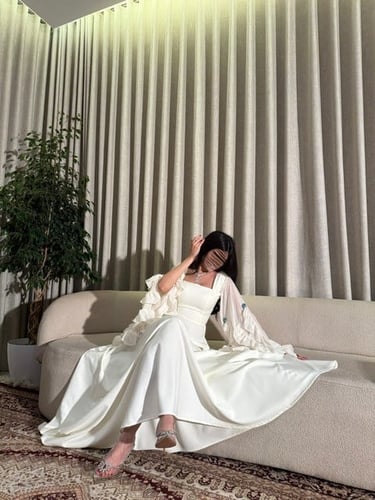 فستان الزمرد اللؤلؤي الأبيض